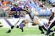 Sep 22, 2013; Baltimore, MD, USA; Baltimore Ravens running back Bernard Pierce (30) avoids the tackle of Houston Texans safety Shiloh Keo (31) during the game at M&T Bank Stadium. Mandatory Credit: Evan Habeeb-USA TODAY Sports
