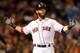 BOSTON, MA - SEPTEMBER 17: Dustin Pedroia #15 of the Boston Red Sox reacts after lining out with two men in scoring position in the 2nd inning against the Baltimore Orioles at Fenway Park on September 17 in Boston, Massachusetts. (Photo by Jim Rogash/Get