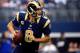 ARLINGTON, TX - SEPTEMBER 22: Quarterback Sam Bradford #8 of the St. Louis Rams in action during the game against the Dallas Cowboys at AT&T Stadium on September 22, 2013 in Arlington, Texas. (Photo by Jamie Squire/Getty Images)