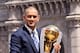 MUMBAI, INDIA - APRIL 03: India's cricket team captain Mahendra Singh Dhoni poses with the ICC Cricket World Cup Trophy, with the Gateway of India in the backdrop, during a photo call at the Taj Palace Hotel on April 3, 2011 in Mumbai, India. (Photo by