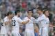 MADRID, SPAIN - SEPTEMBER 22: Cristiano Ronaldo (R) of Real Madrid celbrates with Francisco Roman alias 'Isco' (#23) after Isco scored Real's 3rd goal during the La Liga match between Real Madrid and Getafe at Bernabeu stadium on September 22, 2013 in M