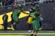 EUGENE, OR. - SEPTEMBER 28: Offensive linesman Hamani Stevens #54 and offensive linesman Jake Fisher #75 of the Oregon Ducks celebrate with running back Byron Marshall #9 of the Oregon Ducks after he scored a touchdown during the first quarter of the game