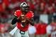 Sep 28, 2013; Columbus, OH, USA; Ohio State Buckeyes quarterback Braxton Miller (5) looks to pass during the fourth quarter against the Wisconsin Badgers at Ohio Stadium. Ohio State Buckeyes defeated Wisconsin Badgers 31-24. Mandatory Credit: Andrew Weber