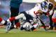 FOXBORO, MA - AUGUST 29: Da'Rel Scott #33 of the New York Giants reaches over the goal line for a touchdown in the second half against the New England Patriots during the preseason game at Gillette Stadium on August 29, 2013 in Foxboro, Massachusetts. (Ph