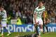 GLASGOW, SCOTLAND - OCTOBER 01: Virgil van Dijk of Celtic assists Neymar of Barcelona during the UEFA Champions League Group H match between Celtic and FC Barcelona at Celtic Park Stadium on October 1, 2013 in Glasgow, Scotland. (Photo by Jeff J Mitchel