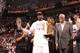 MIAMI, FL - JUNE 20: Basketball legend Bill Russell presents LeBron James #6 of the Miami Heat with the Bill Russell NBA Finals Most Valuable Player Award after the Miami Heat defeat the San Antonio Spurs in Game Seven of the 2013 NBA Finals on June 20, 2
