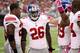 GLENDALE, AZ - OCTOBER 02: Safety Antrel Rolle #26 of the New York Giants celebrates with teammates after an interception against the Arizona Cardinals during the fourth quarter of the NFL game at the University of Phoenix Stadium on October 2, 2011 in G