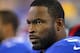 DE Justin Tuck will stand by his head coach