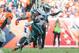 DENVER, CO - SEPTEMBER 29: Running back LeSean McCoy #25 of the Philadelphia Eagles lunges for extra yardage under pursuit by defensive end Robert Ayers #91 of the Denver Broncos in the fourth quarter of a game at Sports Authority Field Field at Mile Hig