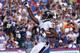 ORCHARD PARK, NY - SEPTEMBER 29: Torrey Smith #82 of the Baltimore Ravens celebrates his touchdown during NFL game action against the Buffalo Bills at Ralph Wilson Stadium on September 29, 2013 in Orchard Park, New York. (Photo by Tom Szczerbowski/Getty I