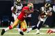 ST LOUIS, MO - SEPTEMBER 26: Chris Givens #13 of the St. Louis Rams recieves a pass against the defense of NaVorro Bowman #53 of the San Francisco 49ers in the second quarter at Edward Jones Dome on September 26, 2013 in St Louis, Missouri. (Photo by