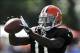 Jul 29, 2012; Berea, OH, USA; Cleveland Browns wide receiver Mohamed Massaquoi (11) makes a catch during training camp at the Cleveland Browns training facility. Mandatory Credit: David Richard-USA TODAY Sports