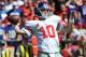 KANSAS CITY, MO - SEPTEMBER 29: Quarterback Eli Manning #10 of the New York Giants throws a 69-yard touchdown pass against the Kansas City Chiefs during the first half on September 29, 2013 at Arrowhead Stadium in Kansas City, Missouri. (Photo by Peter