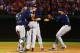 ARLINGTON, TX - SEPTEMBER 30: David Price #14 of the Tampa Bay Rays celebrates with teammates after defeating the Texas Rangers 5 to 2 in the American League Wild Card tiebreaker game at Rangers Ballpark in Arlington on September 30, 2013 in Arlington, T