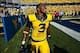 Sep 28, 2013; Morgantown, WV, USA; West Virginia Mountaineers running back Charles Sims (3) celebrates after beating the Oklahoma State Cowboys at Milan Puskar Stadium. Mandatory Credit: Peter Casey-USA TODAY Sports