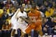 KANSAS CITY, MO - NOVEMBER 24: Avery Bradley #0 of the Texas Longhorns looks to moves the ball against Ashton Gibbs #12 the Pittsburgh Panthers during the CBE Classic championship game on November 24, 2009 at Sprint Center in Kansas City, Missouri. (Phot