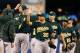 SEATTLE, WA - SEPTEMBER 29: Members of the Oakland Athletics celebrate after defeating the Seattle Mariners 9-0 at Safeco Field on September 29, 2013 in Seattle, Washington. (Photo by Otto Greule Jr/Getty Images)
