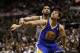 May 14, 2013; San Antonio, TX, USA; Golden State Warriors center Andrew Bogut (12) and San Antonio Spurs forward Tim Duncan (behind) battle for position during the second half in game five of the second round of the 2013 NBA Playoffs at the AT&T Center. M
