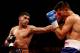 SHEFFIELD, ENGLAND - APRIL 27: Amir Khan in action against Julio Diaz at Motorpoint Arena on April 27, 2013 in Sheffield, England. (Photo by Scott Heavey/Getty Images)