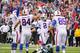 ORCHARD PARK, NY - SEPTEMBER 15: Dan Carpenter #2 of the Buffalo Bills celebrates with teammates after kicking the game winning extra point against the Carolina Panthers at Ralph Wilson Stadium on September 15, 2013 in Orchard Park, New York.Buffalo won 2