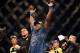 Aug 3, 2013; Rio De Janeiro, Brazil; Phil Davis (pink shorts) celebrates after defeating Lyoto Machida (not pictured) during UFC 163 at HSBC Arena. Mandatory Credit: Jason Silva-USA TODAY Sports