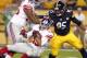 PITTSBURGH, PA - AUGUST 10: Da'Rel Scott #33 of the New York Giants runs the ball in front of Jarvis Jones #95 of the Pittsburgh Steelers during the game on August 10, 2013 at Heinz Field in Pittsburgh, Pennsylvania. (Photo by Justin K. Aller/Getty Imag