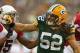 GREEN BAY, WI - AUGUST 09: Clay Matthews #52 of the Green Bay Packers rushes past Michael Floyd #15 of the Arizona Cardinals at Lambeau Field on August 9, 2013 in Green Bay, Wisconsin. The Cardinals defeated the Packers 17-0. (Photo by Jonathan Daniel/Ge