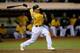OAKLAND, CA - SEPTEMBER 17: Josh Donaldson #20 of the Oakland Athletics hits an RBI wallk-off single scoring Jemile Weeks #19 in the bottom of the ninth innings to defeat the Los Angeles Angels of Anaheim 2-1. at O.co Coliseum on September 17, 2013 in Oa
