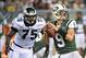 August 30, 2012; Philadelphia, PA USA; New York Jets quarterback Matt Simms (9) sets to throw under pressure by Philadelphia Eagles defensive end Vinny Curry (75) during preseason game at Lincoln Financial Field. The Eagles defeated the Jets, 28-10. Manda
