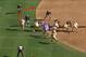Motioning a tight end into the backfield creates a run-heavy look.