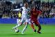 SWANSEA, WALES - SEPTEMBER 16: Swansea player Michu (l) beats Andre Wisdom to the ball to score the second Swansea goal during the Barclays Premier League match between Swansea City and Liverpool at Liberty Stadium on September 16, 2013 in Swansea, Wales