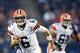 Aug 29, 2013; Chicago, IL, USA; Cleveland Browns quarterback Brian Hoyer (6) rushes the ball against the Chicago Bears during the first quarter at Soldier Field. Mandatory Credit: Mike DiNovo-USA TODAY Sports