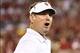 Sep 7, 2013; Norman, OK, USA; Oklahoma Sooners head coach Bob Stoops yells from the sidelines in the fourth quarter against the West Virginia Mountaineers at Gaylord Family - Oklahoma Memorial Stadium. The Oklahoma Sooners beat the West Virginia Mountaine