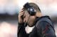 FOXBORO, MA - SEPTEMBER 22: Head coach Greg Schiano holds his head during the fourth quarter of their 23-3 loss to the New England Patriots at Gillette Stadium on September 22, 2013 in Foxboro, Massachusetts. (Photo by Winslow Townson/Getty Images)