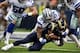 Sep 22, 2013; Arlington, TX, USA; St. Louis Rams running back Isaiah Pead (24) is tackled by Dallas Cowboys outside linebacker Bruce Carter (54) in the third quarter of the game at AT&T Stadium. Mandatory Credit: Tim Heitman-USA TODAY Sports