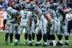 HOUSTON, TX - SEPTEMBER 29: Russell Wilson #3 of the Seattle Seahawks calls a play in the huddle against the Houston Texans at Reliant Stadium on September 29, 2013 in Houston, Texas. (Photo by Scott Halleran/Getty Images)