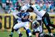 JACKSONVILLE, FL - SEPTEMBER 29: Paul Posluszny #51 of the Jacksonville Jaguars attempts to tackle Trent Richardson #34 of the Indianapolis Colts during the game at EverBank Field on September 29, 2013 in Jacksonville, Florida. (Photo by Sam Greenwood
