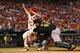 ST. LOUIS, MO - SEPTEMBER 7: Shane Robinson #43 of the St. Louis Cardinals is tagged out by Russell Martin #55 of the Pittsburgh Pirates in the fifth inning at Busch Stadium on September 7, 2013 in St. Louis, Missouri. (Photo by Dilip Vishwanat/Getty Ima