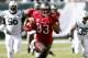 EAST RUTHERFORD, NJ - SEPTEMBER 8: Vincent Jackson #83 of the Tampa Bay Buccaneers runs the ball against the New York Jets during their game at MetLife Stadium on September 8, 2013 in East Rutherford, New Jersey. (Photo by Jeff Zelevansky/Getty Images)