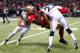 ST LOUIS, MO - SEPTEMBER 26: Anquan Boldin #81 of the San Francisco 49ers is tackled by Cortland Finnegan #31 and Rodney McLeod #23 of the St. Louis Rams in the second quarter at Edward Jones Dome on September 26, 2013 in St Louis, Missouri. (Photo by