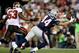 Aug 16, 2013; Foxborough, MA, USA; New England Patriots tight end Zach Sudfeld (44) makes a reception for a touchdown while defended by Tampa Bay Buccaneers linebacker Najee Goode (53) during the second quarter at Gillette Stadium. Mandatory Credit: Greg