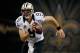 NEW ORLEANS, LA - SEPTEMBER 30: Quarterback Drew Brees #9 of the New Orleans Saints runs with the ball in the first half against the Miami Dolphins at the Mercedes-Benz Superdome on September 30, 2013 in New Orleans, Louisiana. (Photo by Chris Graythen/