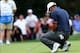 Oct 3, 2013; Dublin, OH, USA; Tiger Woods reacts to a putt on the second green during the Thursday four ball matches of the Presidents Cup at Muirfield Village Golf Club. Mandatory Credit: Allan Henry-USA TODAY Sports