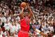 MIAMI, FL - MAY 15: Jimmy Butler #21 of the Chicago Bulls misses a game-tying three-pointer as time runs out in the fourth quarter against the Miami Heat in Game Five of the Eastern Conference Semifinals during the 2013 NBA Playoffs on May 15, 2013 at Ame