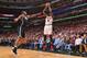 CHICAGO, IL - APRIL 25: Luol Deng #9 of the Chicago Bulls shoots a three-pointer against Joe Johnson #7 of the Brooklyn Nets in Game Three of the Eastern Conference Quarterfinals during the 2013 NBA Playoffs on April 25, 2013 at United Center in Chicago,