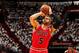 MIAMI, FL - MAY 15: Carlos Boozer #5 of the Chicago Bulls shoots a free-throw against the Miami Heat in Game Five of the Eastern Conference Semifinals during the 2013 NBA Playoffs on May 15, 2013 at American Airlines Arena in Miami, Florida. NOTE TO USER: