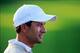 Oct 3, 2013; Dublin, OH, USA; Adam Scott on the 18th green during the Thursday four ball matches of the Presidents Cup at Muirfield Village Golf Club. Mandatory Credit: Allan Henry-USA TODAY Sports