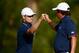 DUBLIN, OH - OCTOBER 03: Zach Johnson (L) and Jason Dufner of the U.S. Team celebrate a birdie on the ninth hole during the Day One Four-Ball Matches at the Muirfield Village Golf Club on October 3, 2013 in Dublin, Ohio. (Photo by Matt Sullivan/Getty I