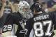 Oct 3, 2013; Pittsburgh, PA, USA; Pittsburgh Penguins goalie Marc-Andre Fleury (29) and center Sidney Crosby (87) react after defeating the New Jersey Devils at the CONSOL Energy Center. The Pittsburgh Penguins won 3-0. Mandatory Credit: Charles LeClaire-