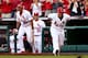 ST LOUIS, MO - OCTOBER 03: (R-L) Yadier Molina #4 and Adam Wainwright #50 of the St. Louis Cardinals celebrate in the third inning against the Pittsburgh Pirates during Game One of the National League Division Series at Busch Stadium on October 3, 2013 i
